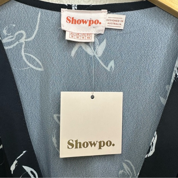 NWT Showpo Beat Of Your Own Drum Dress in Black Line Print Wrap Dress - Picture 3 of 8